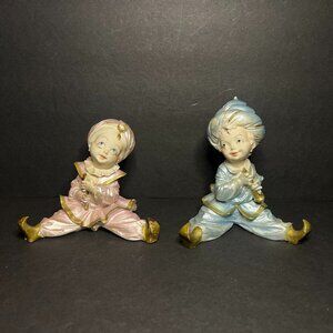 Vintage Set of 2 Ceramic Pink & Blue Genie Sultan Figurines Playing the Flute